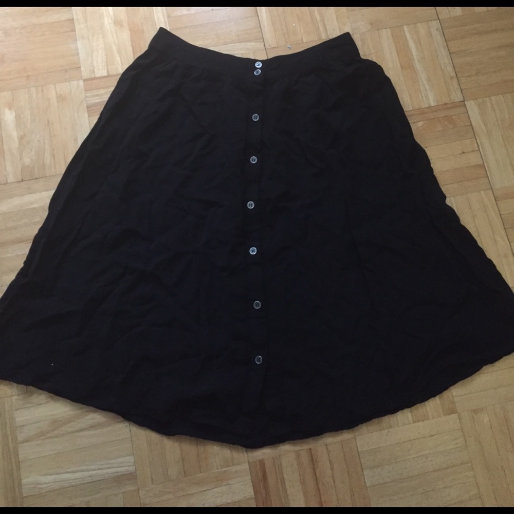 Midi length black skirt