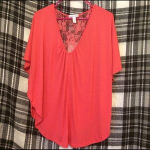 Sweet coral colored blouse. Very light weight.