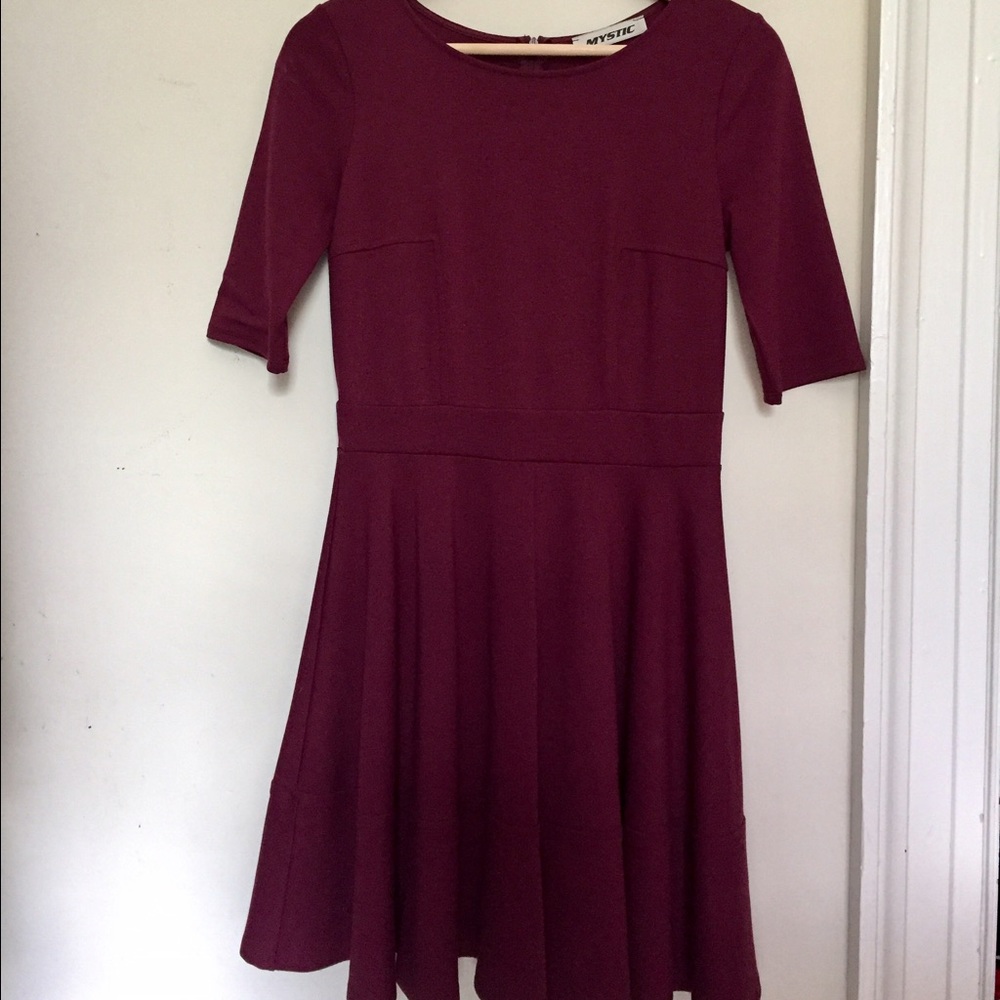 Long sleeved burgundy fit and flare dress