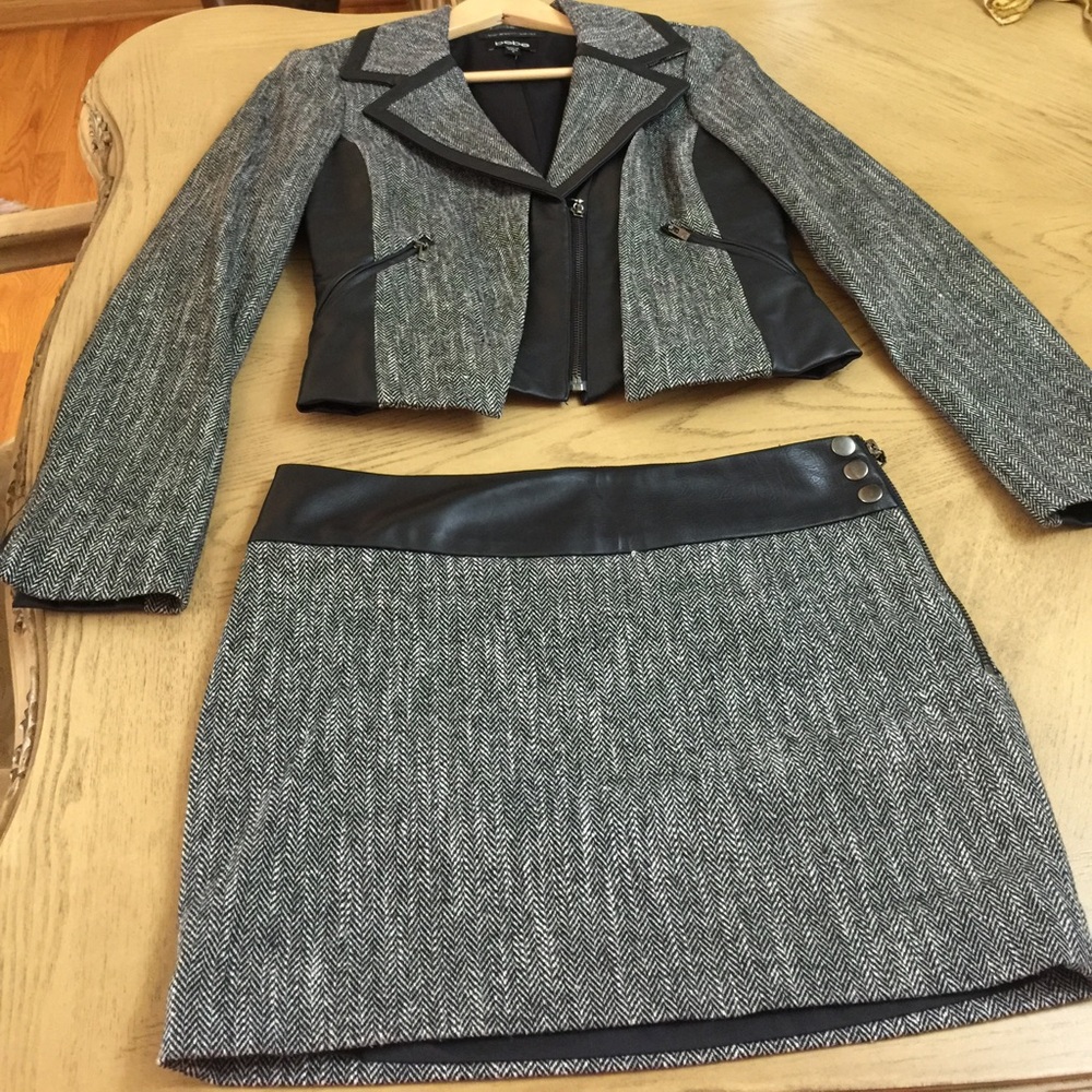 BEBE faux leather jacket along with mini skirt