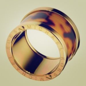 Gold trimmed tortoise Michael Kors ring