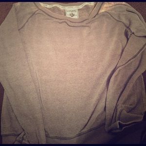 Grey sweatshirt with writing on the back