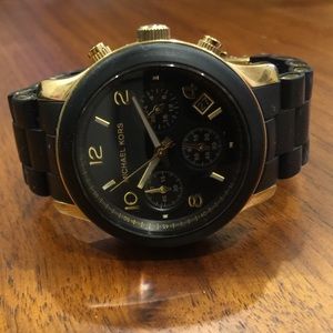 Used mk watch needs new battery