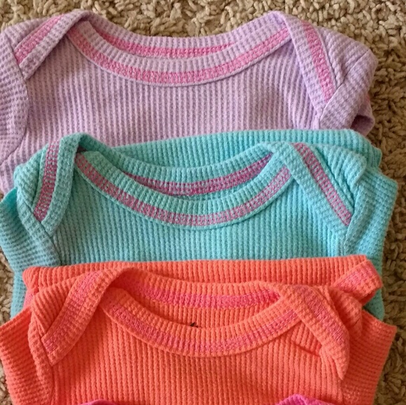 RBX Other - 4 baby girl RBX bodysuits size 3-6 months