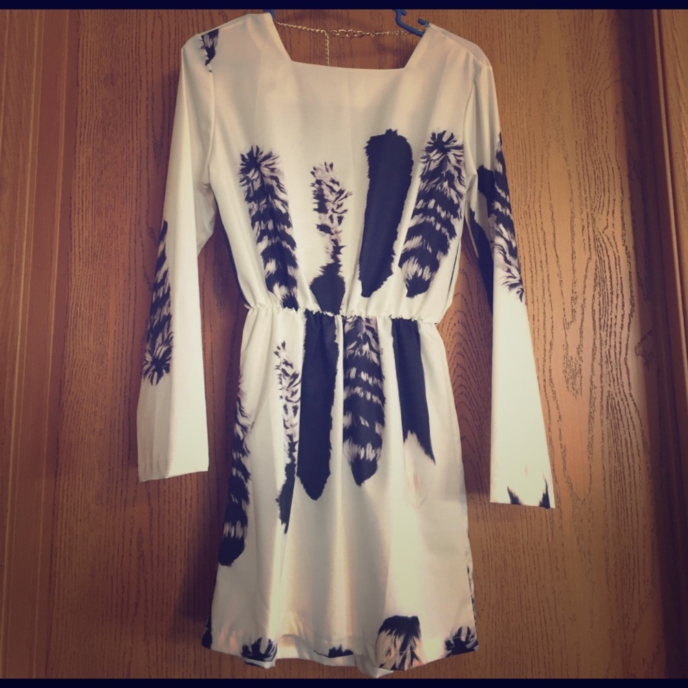 Blue and white long sleeved dress