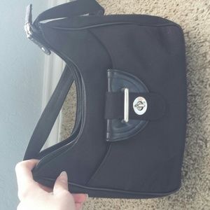 I outgrew this purse, Now use big purses to fit ev