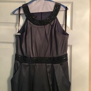 Dark grey cocktail dress with beading and pockets