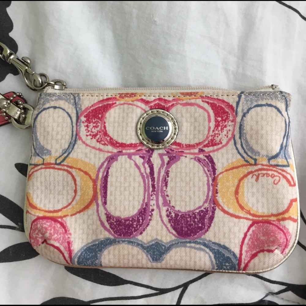 Cream and colorful Coach Wristlet
