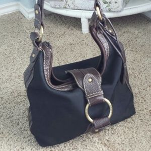 I use massively large purses now :p