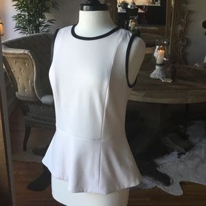 Peplum cream top with leather trim