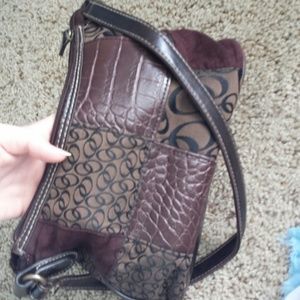 I use giant purses now :p