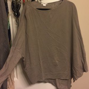 Asymmetrical fleece sweater