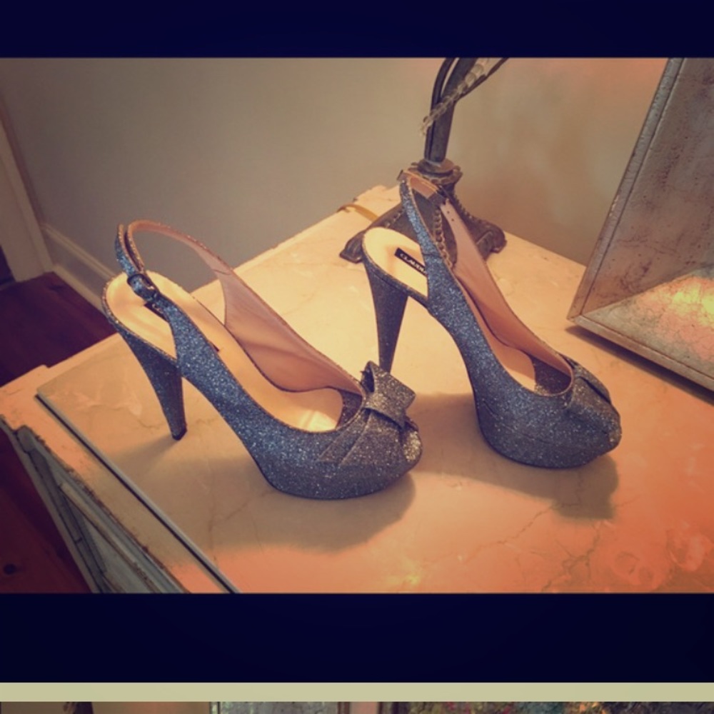 Claudia Heels never worn. Size 8 1/2.