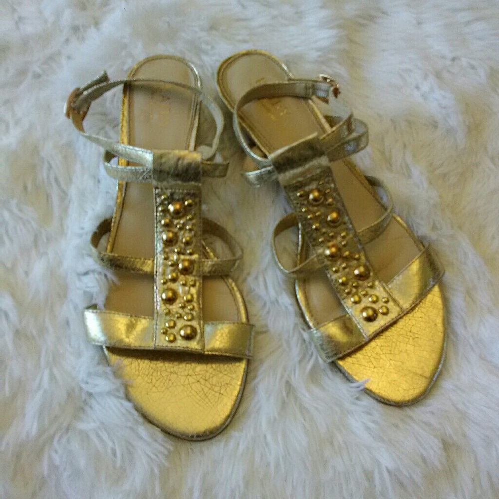Gold strappy Kathy Van Zeeland sandals