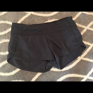 Size 8 black lululemon shorts
