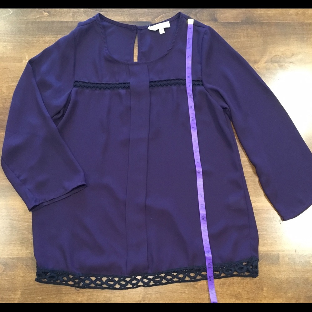 Deep purple crochet-trimmed blouse
