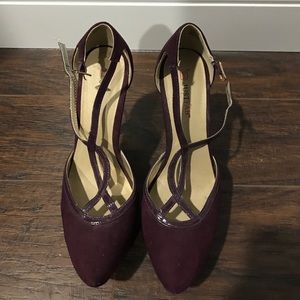 Dark purple pumps