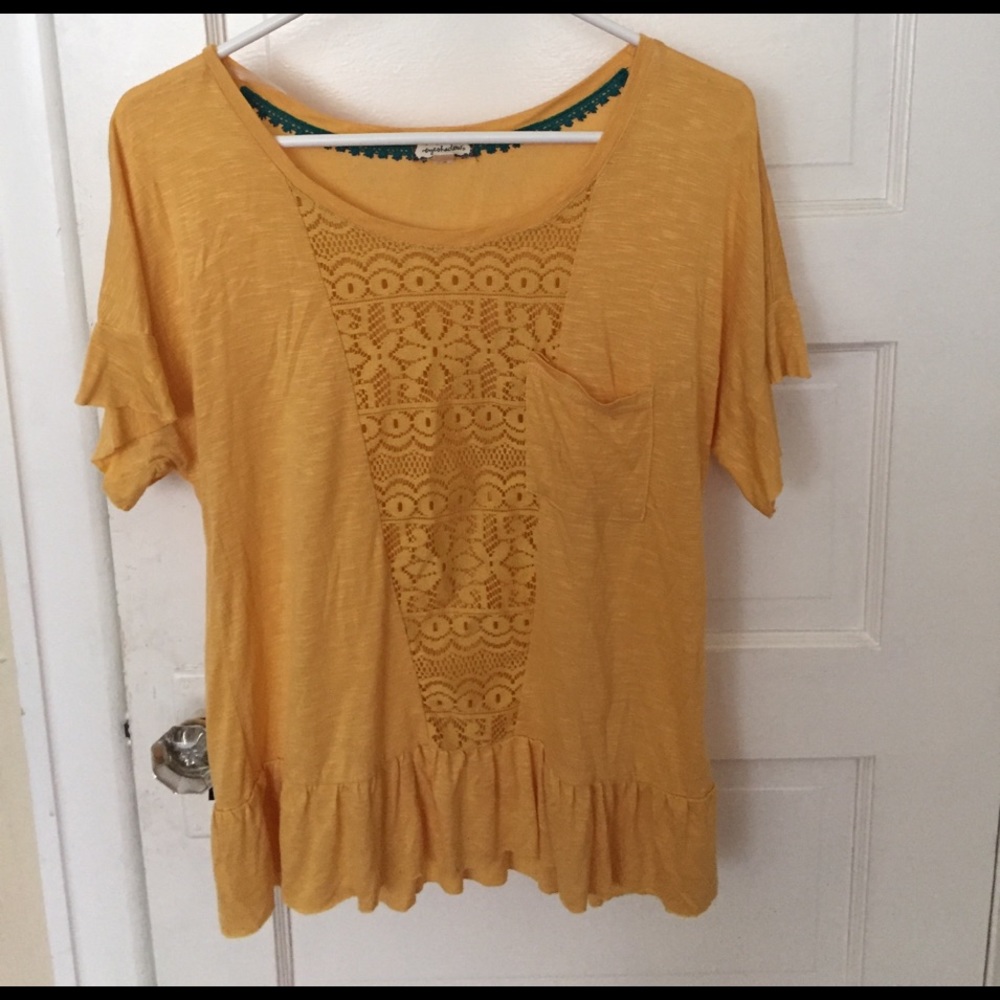 Yellow ruffled shirt