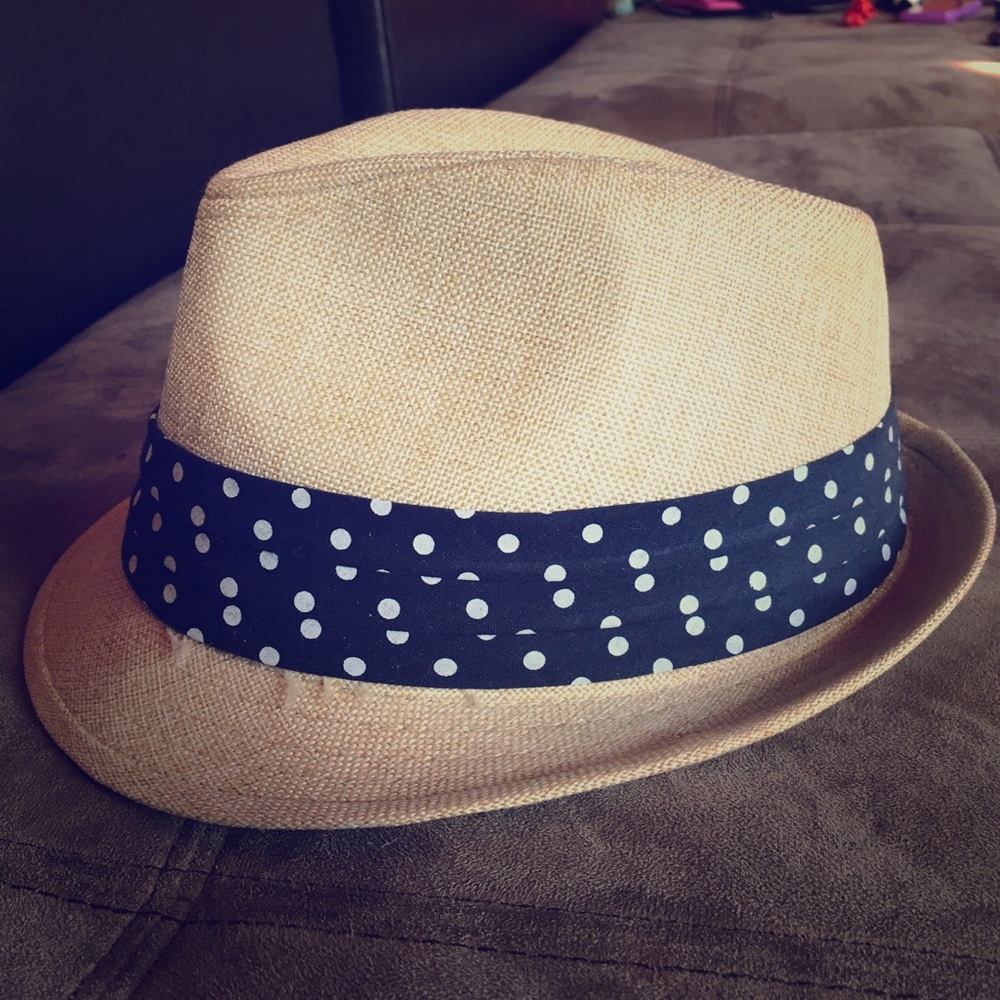 Tan hat with navy blue band