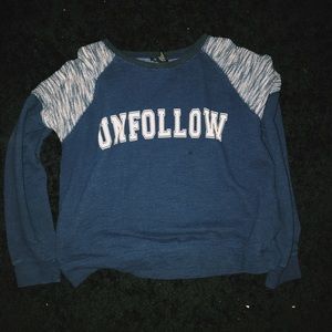 "UNFOLLOW" sweater