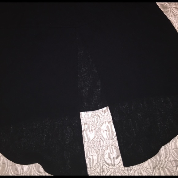 A black, loose blouse with short sleeves! - Picture 3 of 4