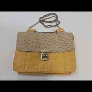 Big Buddha embossed yellow chain shoulder bag