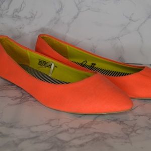 Neon-orange flats.