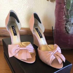 Light pink Nina brand shoes, wedge heels.