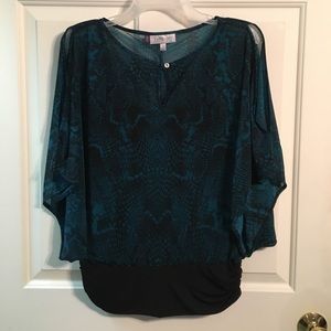 Jennifer Lopez dolman top