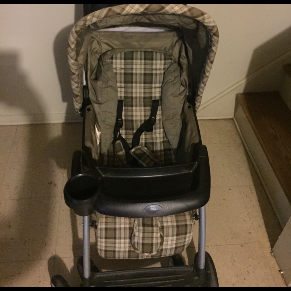 A greenish brown stroller