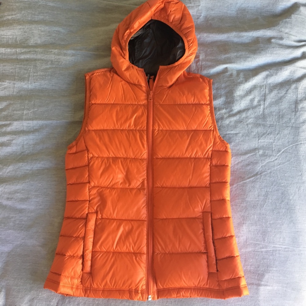 Orange puffy vest with hood