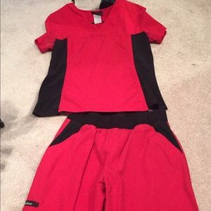 Small red Cherokee scrubs with stretchy cloth band