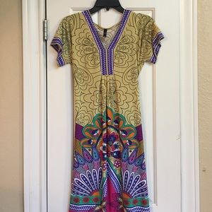 Yellow and multi colored dress.