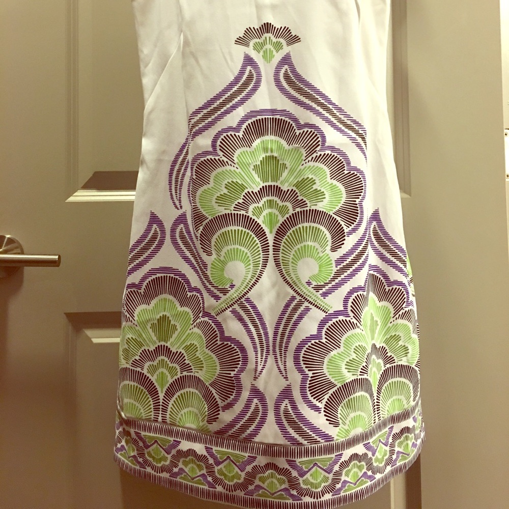 Classic white dress with a unique design
