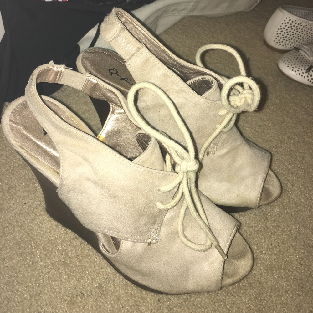 Beige wedges.