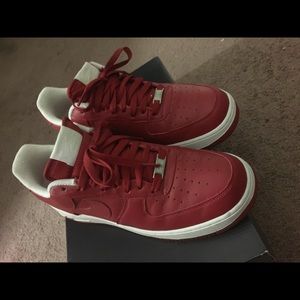 Red leather low top uptowns