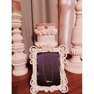 Sideways cross necklace