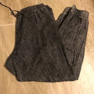 Acid washed. Grey joggers