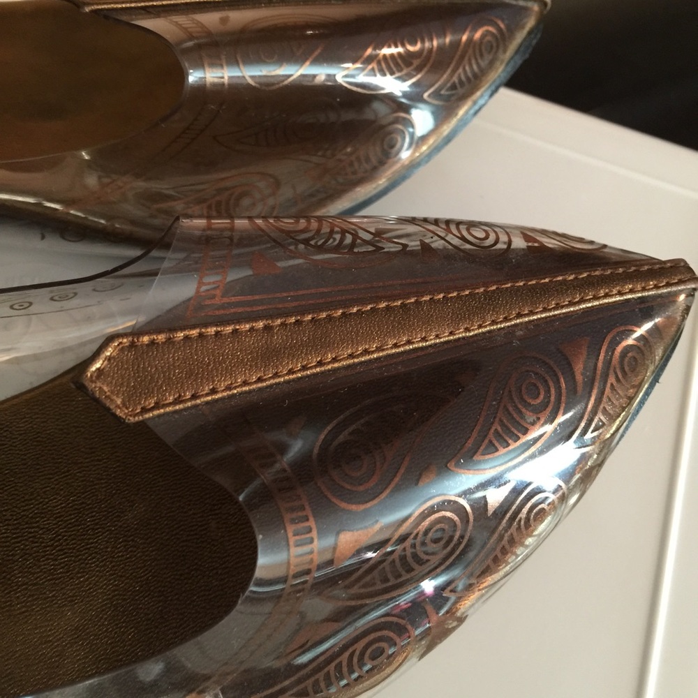 One of a kind slip-ons flats in copper color.