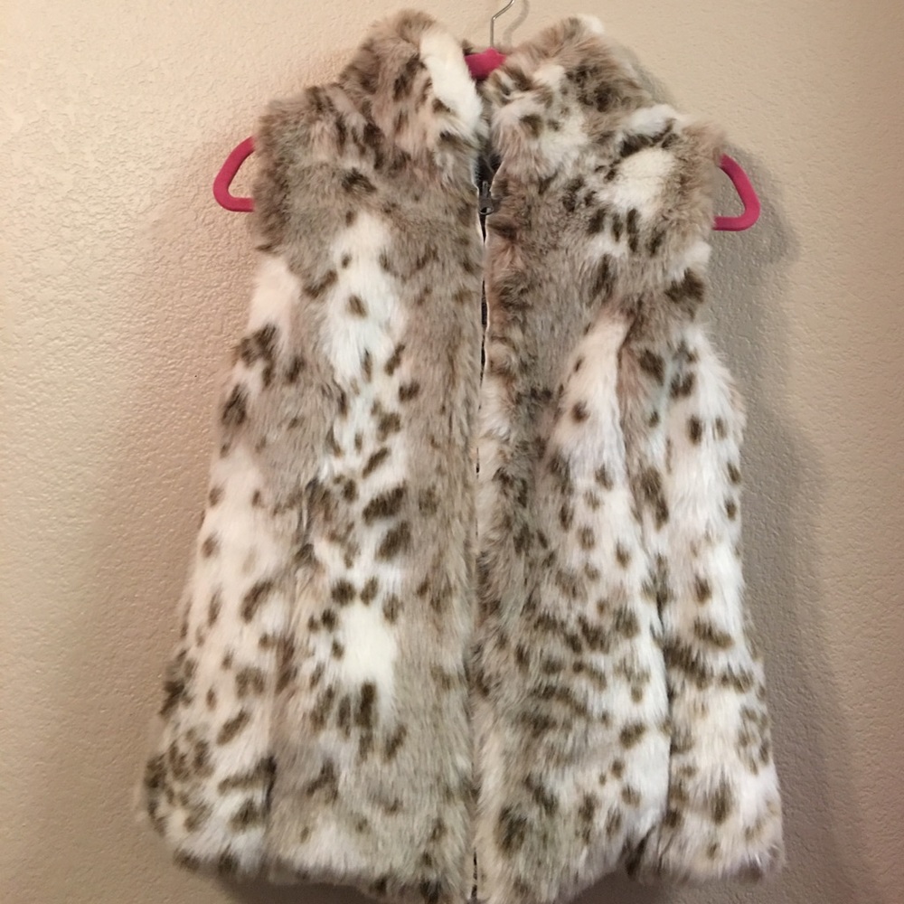Faux fur and faux leather vest reversible 👍