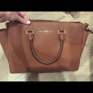Tan brown leather Michael Kord bag