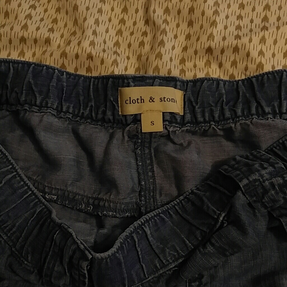 Cloth and stone skirt from anthropology s