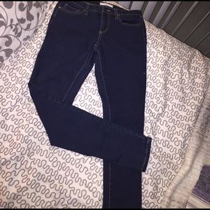 Denim skinny jeans from Alter'd State boutique.