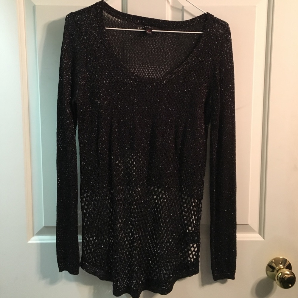 New black sweater with hole like details