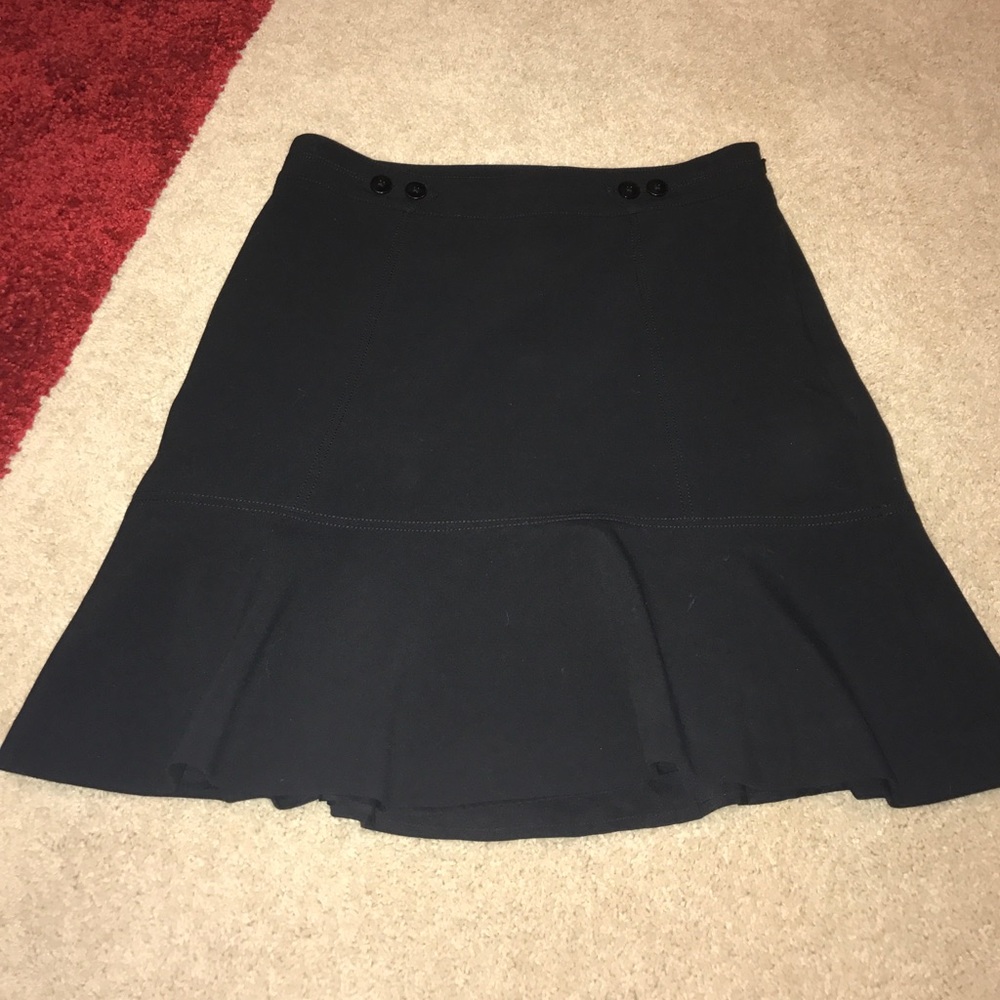 Black above the knee fluted skirt