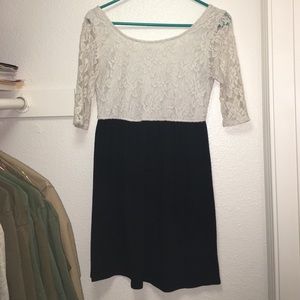 White Lace top dress with short black bottom.