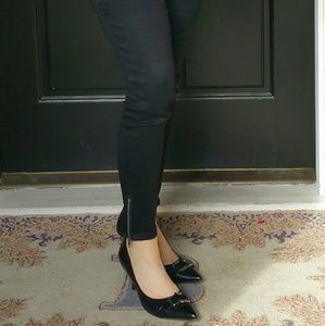 Nine West silver buckle pumps