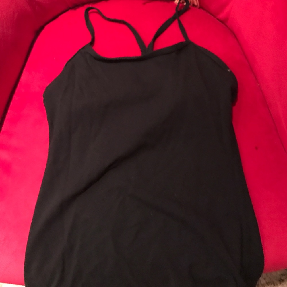 Black lululemon top. No size tag believe size 6