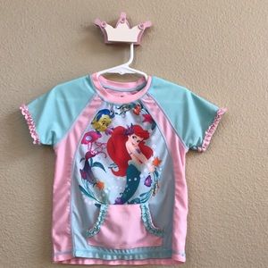 Little mermaid swimsuit shirt.