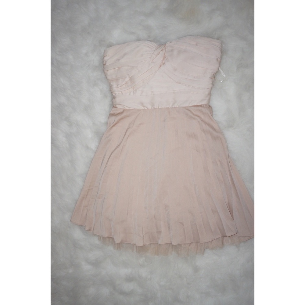 BEBE| Cream strapless Dress